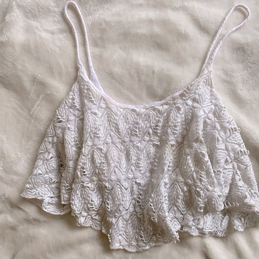 White lace crop top. Slightly worn and stained